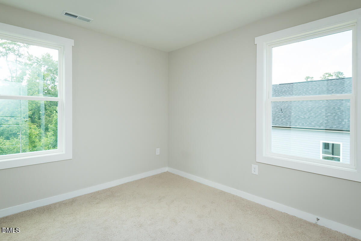 1016 Pinnix Loop Burlington, NC 27217 - Photo 16 of 22 an empty room with a window
