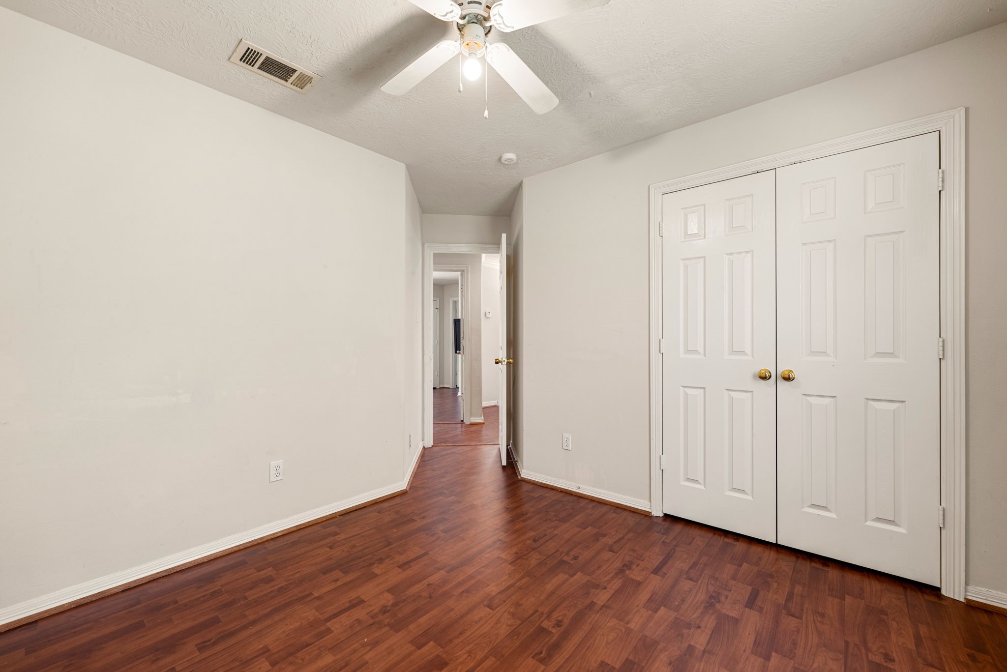 6418 England Street Houston, TX 77021 - Photo 16 of 29 a view of an empty room with wooden floor