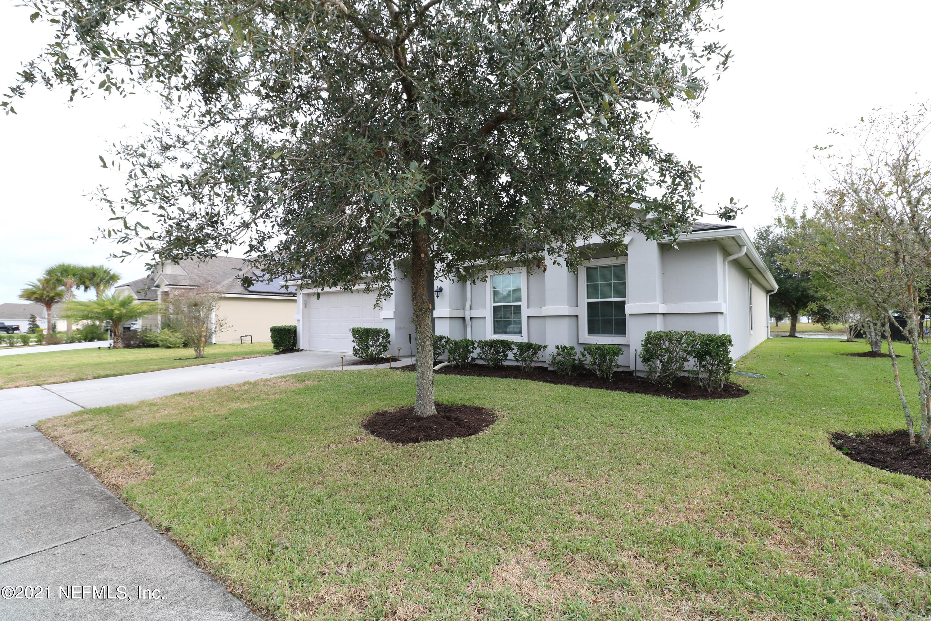 437 South Hamilton Springs Road St. Augustine, FL 32084 - Photo 2 of 32 side yard