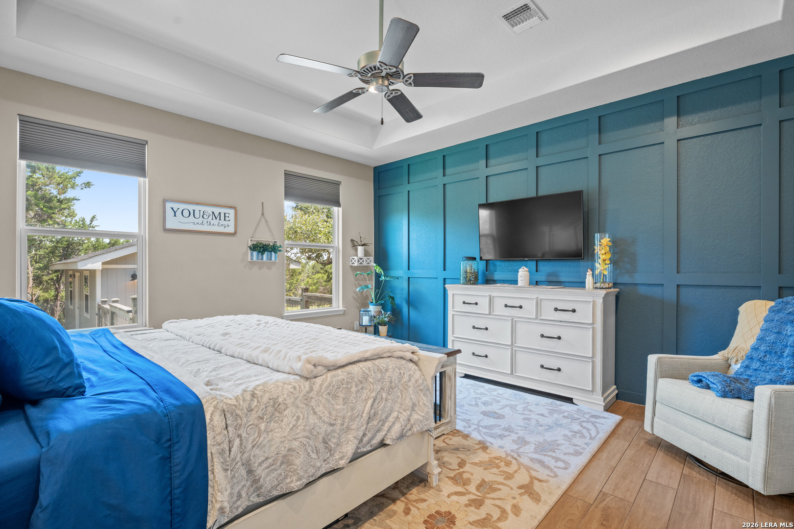 819 Primrose Path Spring Branch, TX 78070 - Photo 8 of 17 a bedroom with a bed flat screen tv and a couch