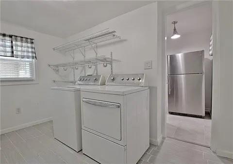 2526 Semmes Street Atlanta, GA 30344 - Photo 21 of 29 a utility room with dryer and washer