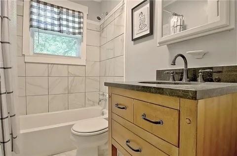 2526 Semmes Street Atlanta, GA 30344 - Photo 27 of 29 a bathroom with a sink toilet and shower