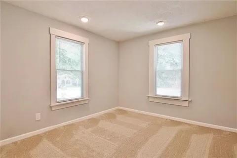2526 Semmes Street Atlanta, GA 30344 - Photo 28 of 29 an empty room with windows