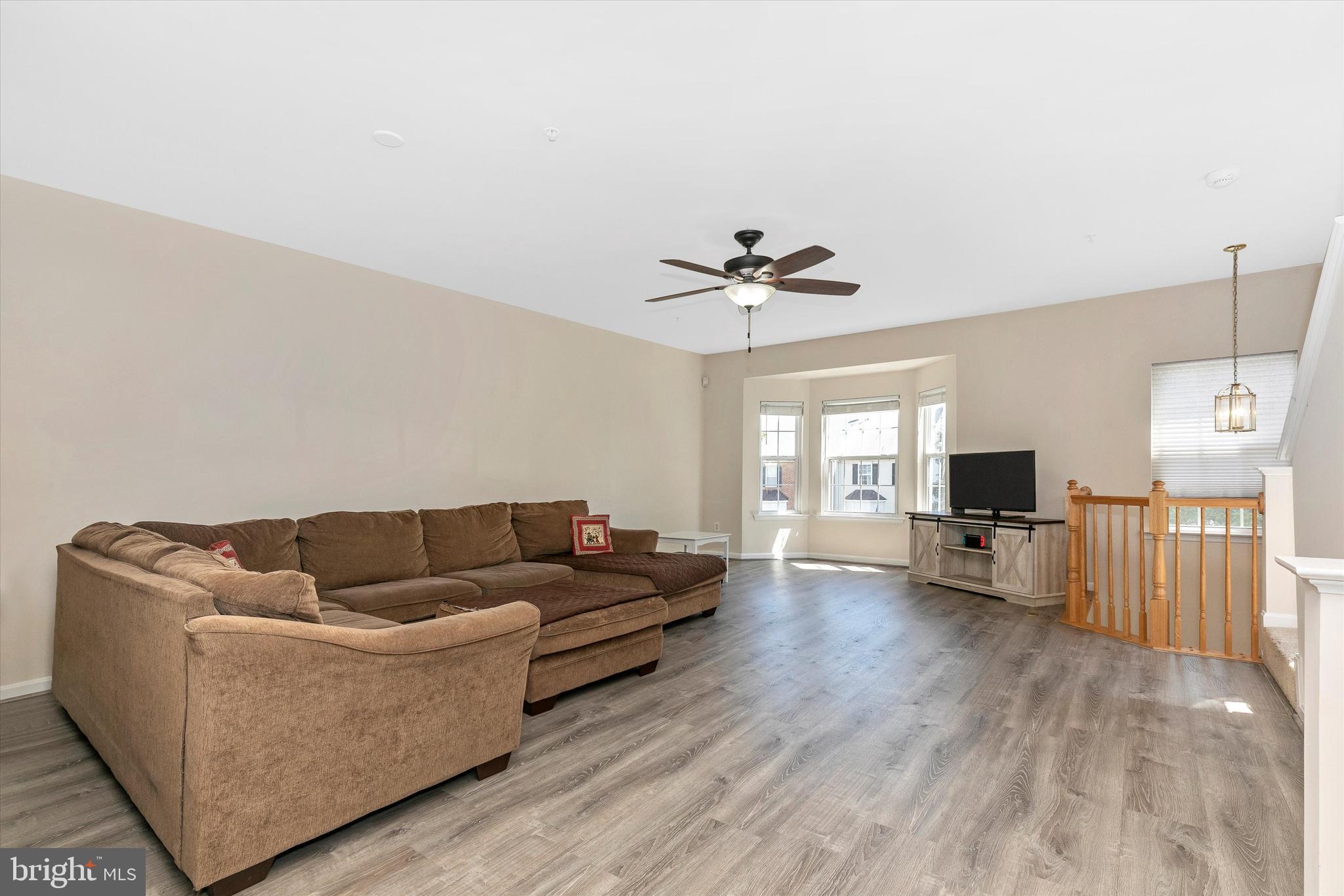 1742 Trestle Street Mount Airy, MD 21771 - Photo 13 of 58 a living room with furniture and a flat screen tv