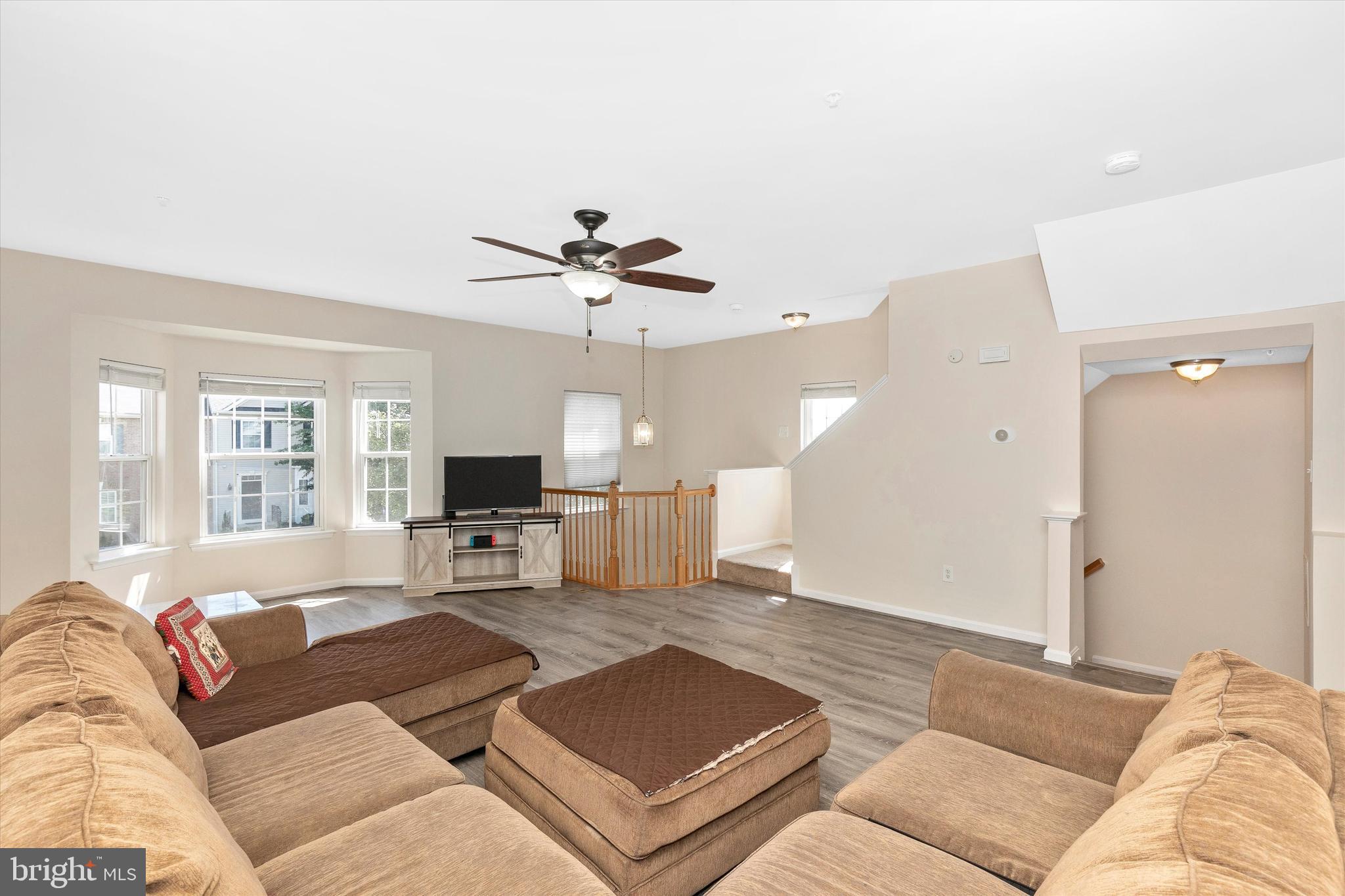 1742 Trestle Street Mount Airy, MD 21771 - Photo 14 of 58 a living room with furniture and a large window