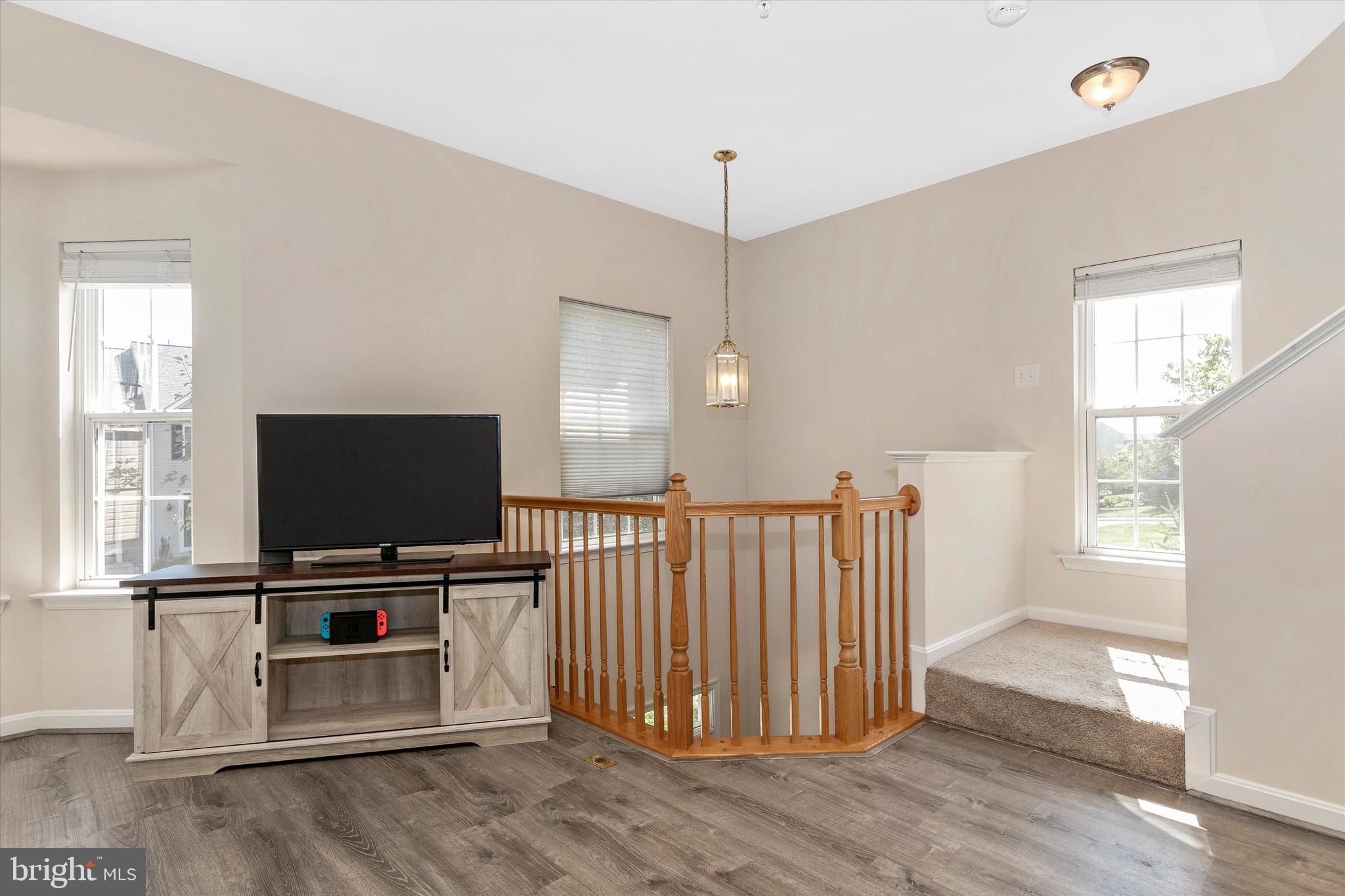 1742 Trestle Street Mount Airy, MD 21771 - Photo 17 of 58 a living room with furniture and a flat screen tv
