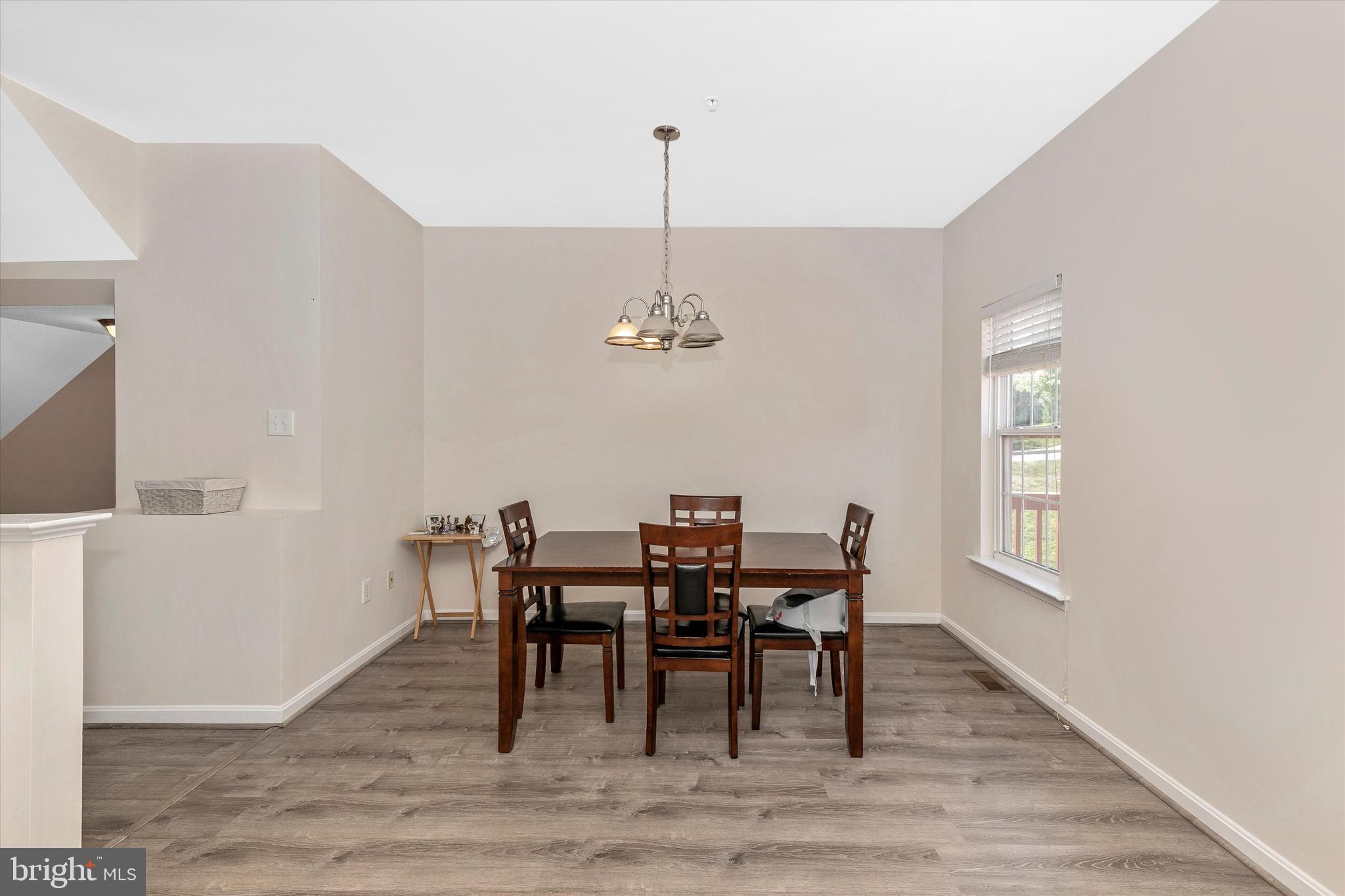 1742 Trestle Street Mount Airy, MD 21771 - Photo 18 of 58 a dining room with furniture window and wooden floor