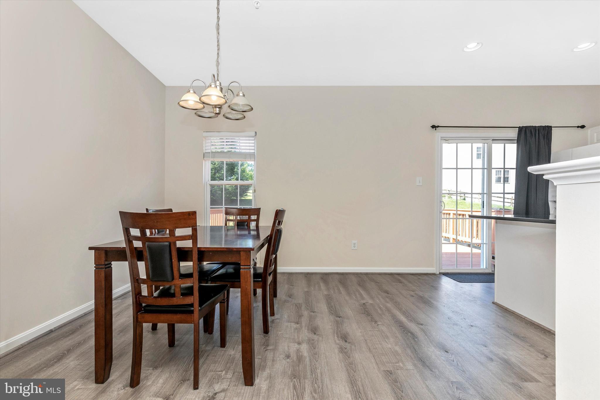 1742 Trestle Street Mount Airy, MD 21771 - Photo 19 of 58 a view of a dining room with furniture window and wooden floor