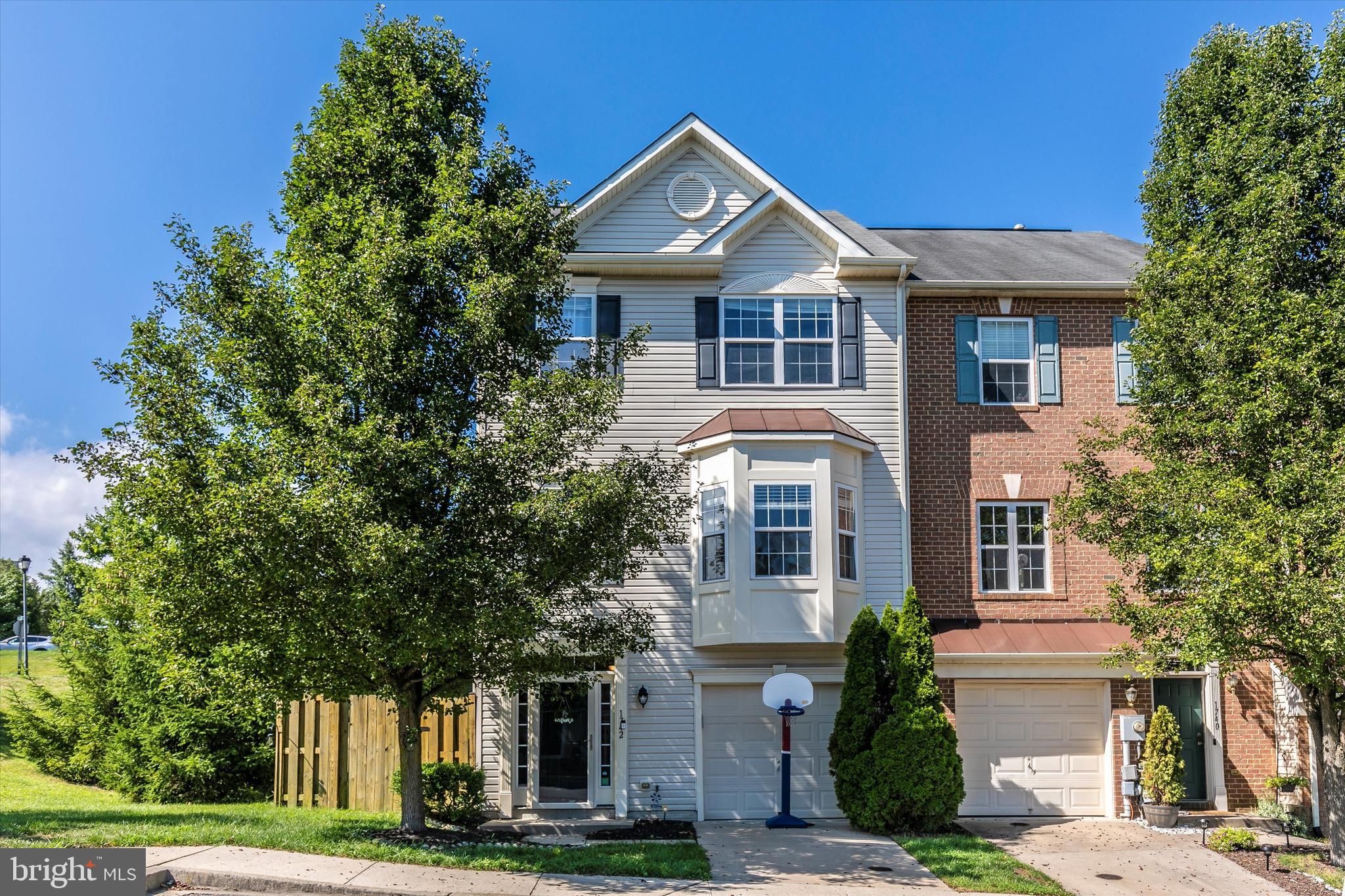 1742 Trestle Street Mount Airy, MD 21771 - Photo 55 of 58 a front view of a house with a yard