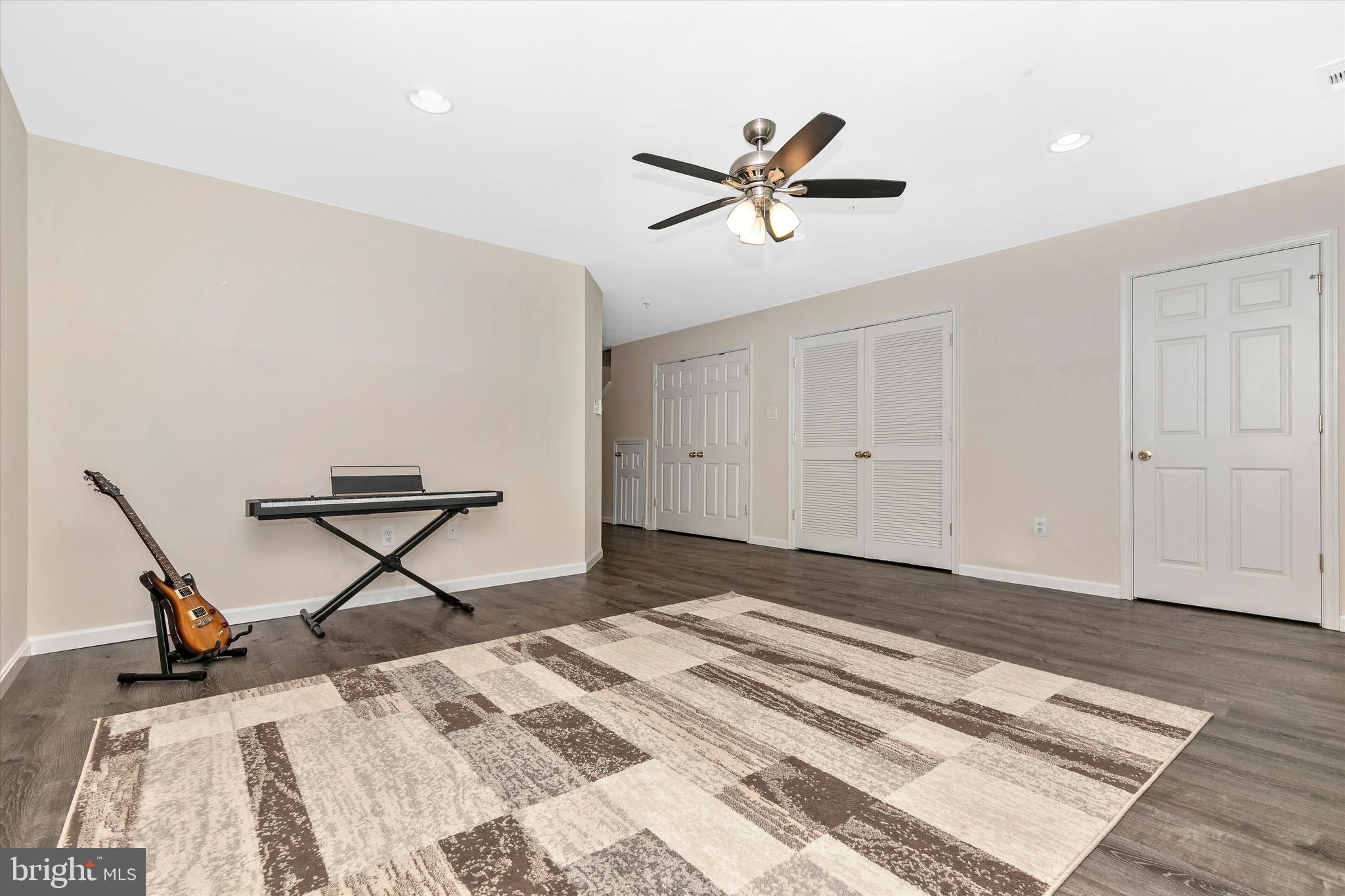 1742 Trestle Street Mount Airy, MD 21771 - Photo 7 of 58 a bedroom with a bed and a chandelier