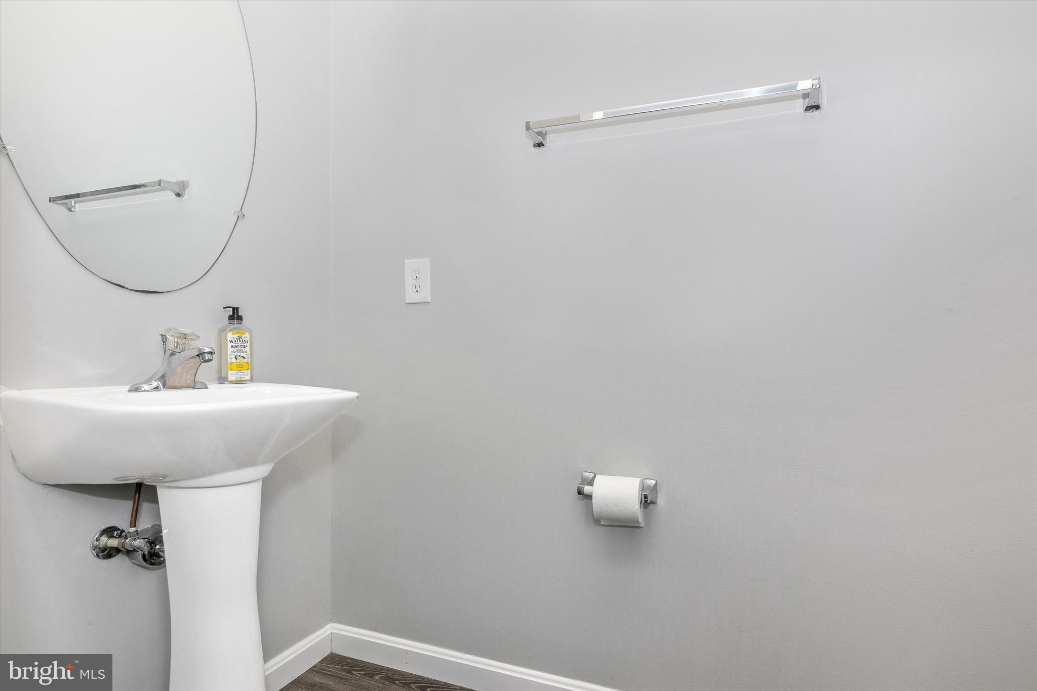 1742 Trestle Street Mount Airy, MD 21771 - Photo 10 of 58 a bathroom with a sink and mirror