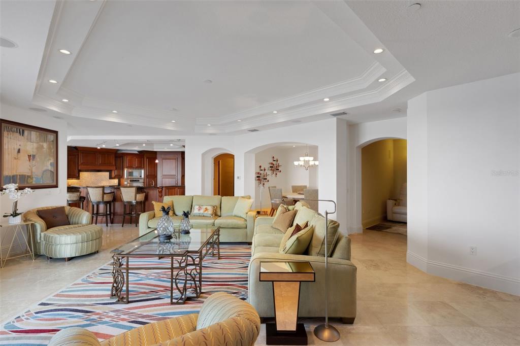 464 Golden Gate Point, Unit 403 Sarasota, FL 34236 - Photo 15 of 95 a living room with furniture and a large window