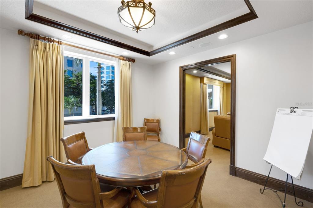 464 Golden Gate Point, Unit 403 Sarasota, FL 34236 - Photo 91 of 95 a dining room with furniture and window