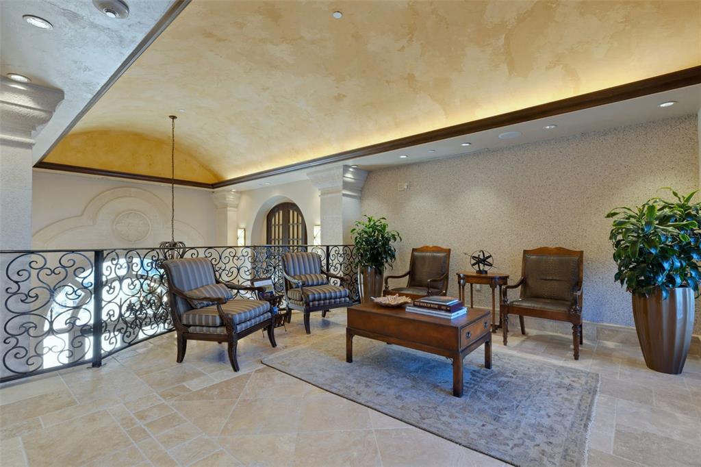 464 Golden Gate Point, Unit 403 Sarasota, FL 34236 - Photo 94 of 95 a living room with furniture and a potted plant