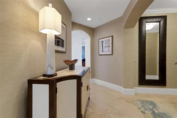 a bathroom with a toilet and a mirror