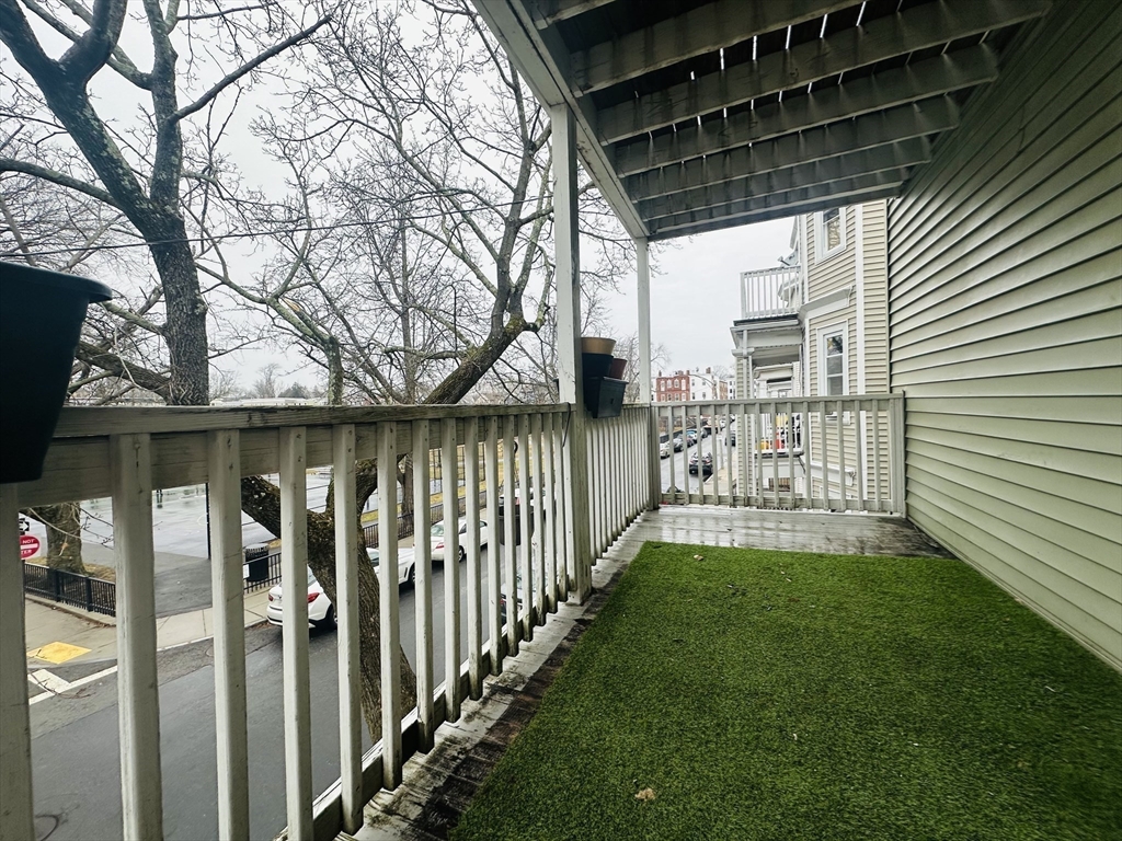 28 Melbourne Street, Unit 2 Boston, MA 02124 - Photo 23 of 27 a view of yard from a porch