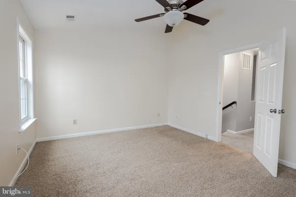 a bathroom with a toilet and a sink