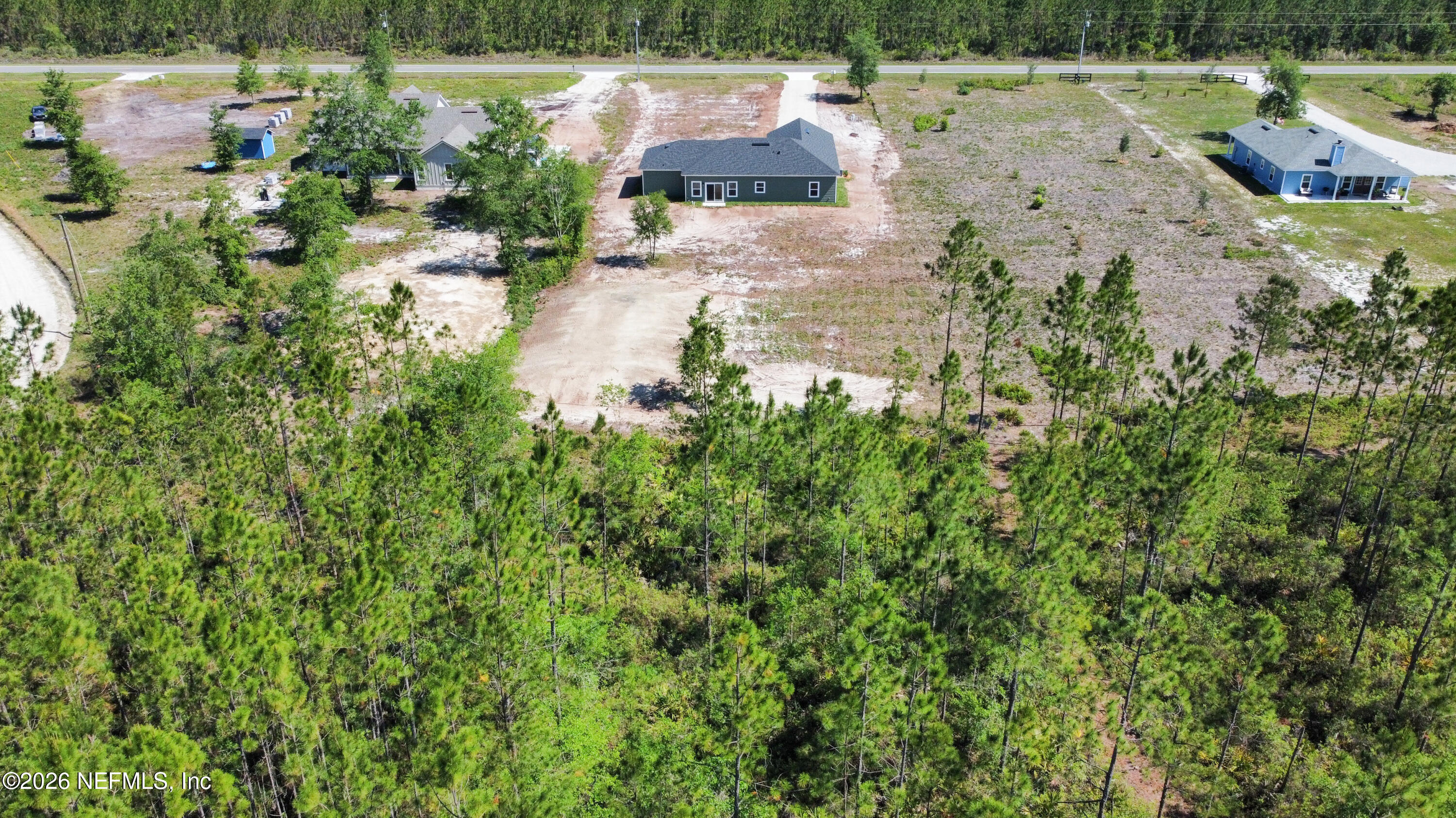 261121 Rowe Road Hilliard, FL 32046 - Photo 33 of 33 a view of a lake with outdoor space
