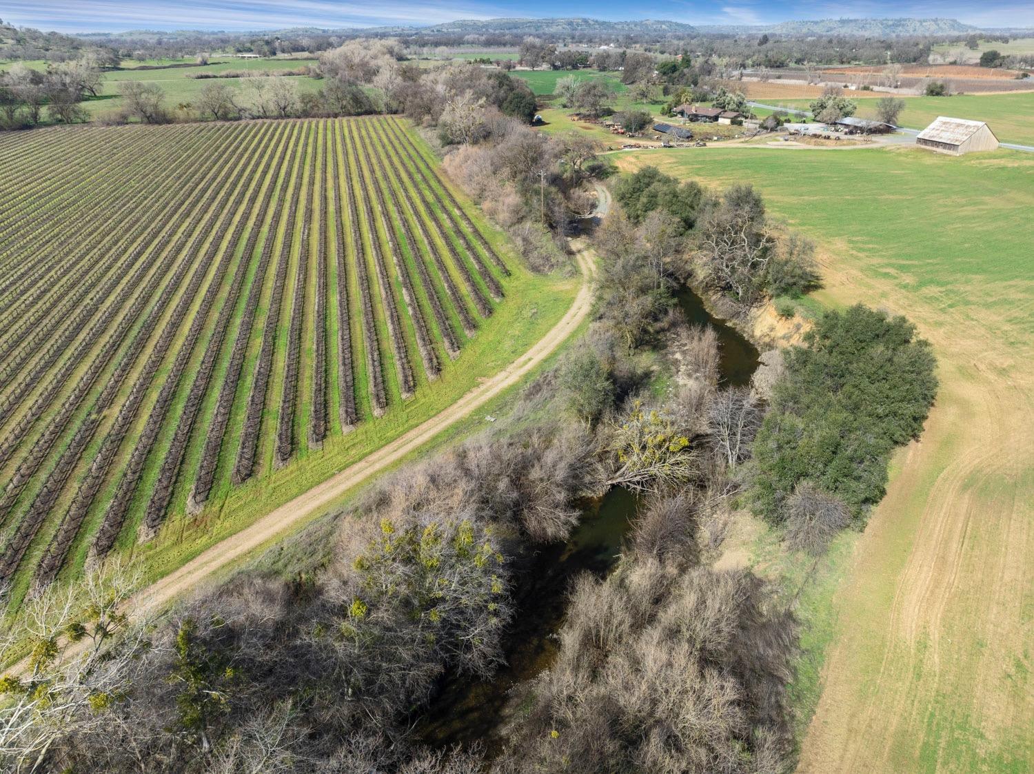 a view of a yard with an outdoor seating