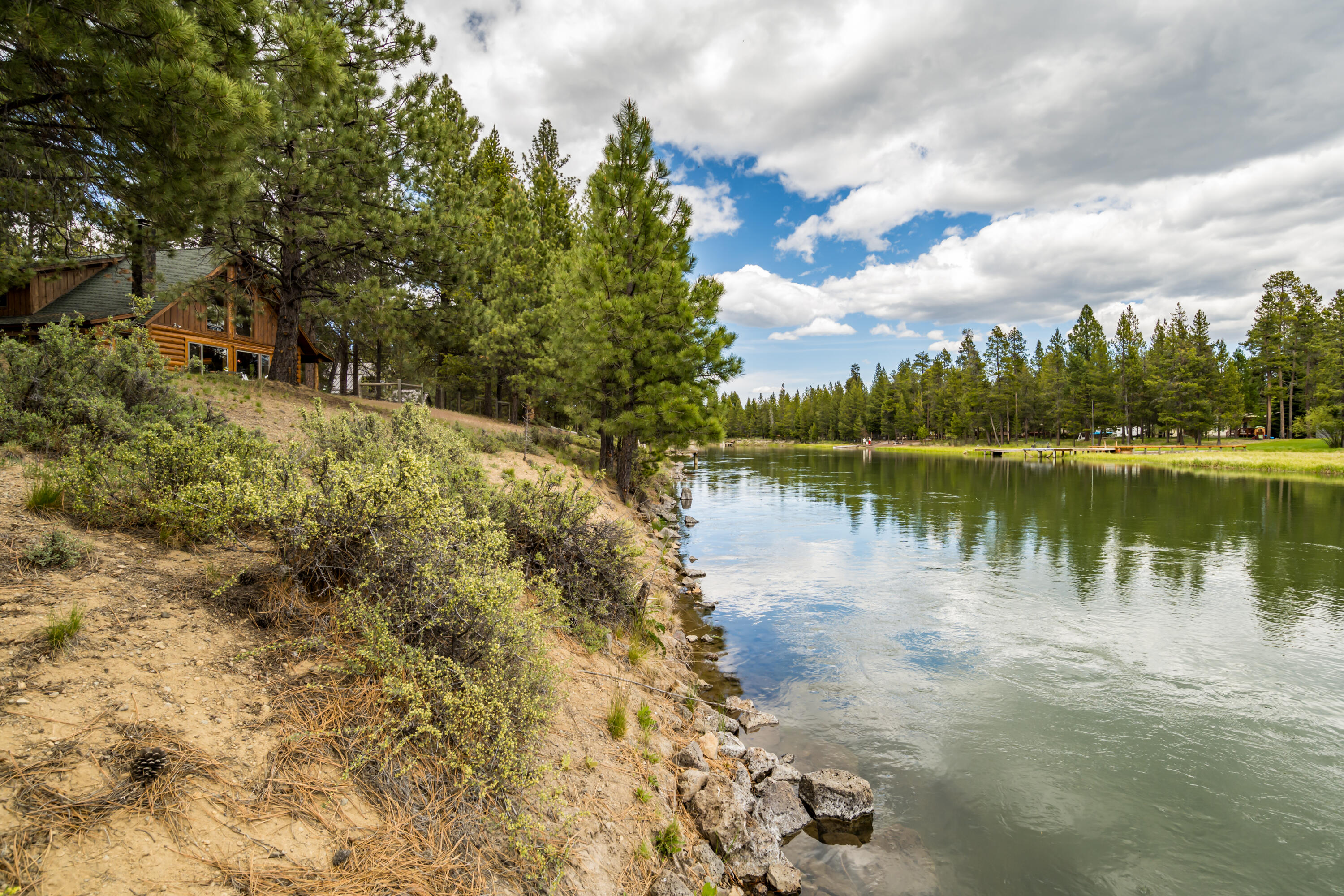 17026 Sharp Drive Bend, OR 97707 - Photo 10 of 72 a view of a lake with houses in the back