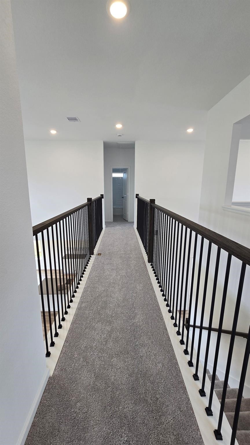 2628 Pine Bluff Drive Rosenberg, TX 77469 - Photo 12 of 15 a view of a hallway with windows