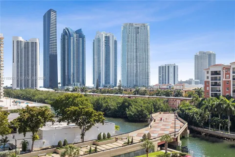 a view of a city with tall buildings