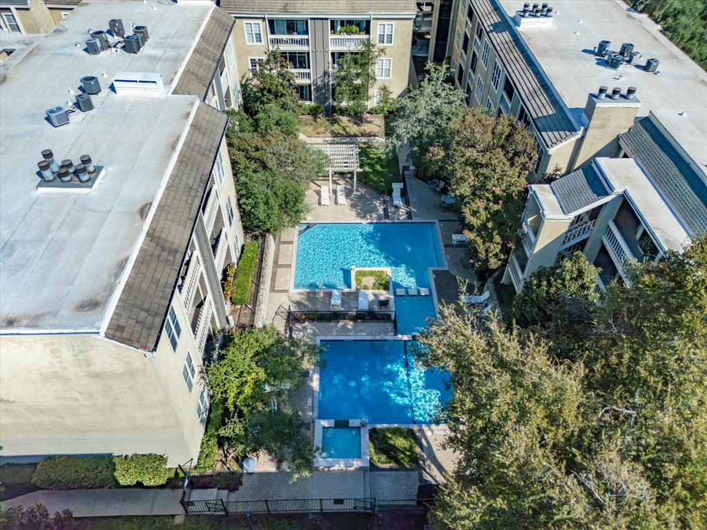 5310 Keller Springs Road, Unit 332 Dallas, TX 75248 - Photo 29 of 39 Bird's eye view of a pool area and apartment complex / building