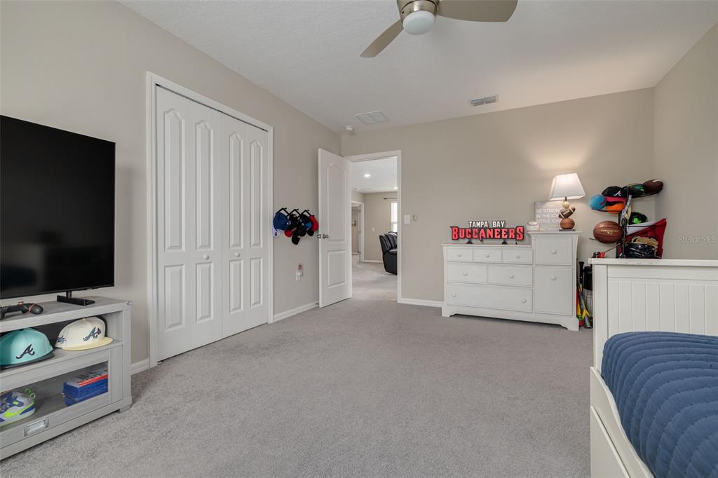 7242 Landmark Drive Spring Hill, FL 34606 - Photo 34 of 45 a view of a livingroom with furniture and toys