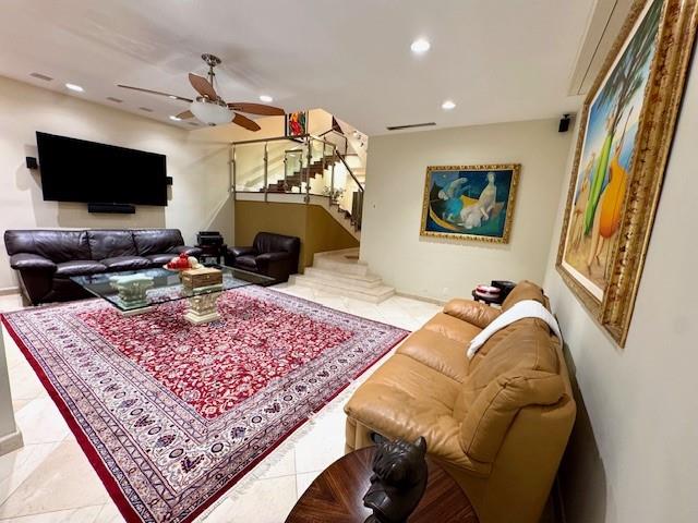 1540 Northeast Quayside Terrace, Unit D1 Miami, FL 33138 - Photo 11 of 45 a living room with furniture and a flat screen tv