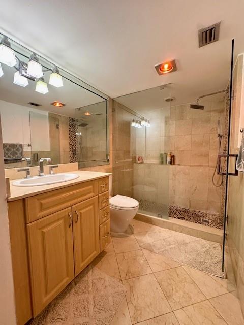 1540 Northeast Quayside Terrace, Unit D1 Miami, FL 33138 - Photo 19 of 45 a bathroom with a sink a toilet and a shower