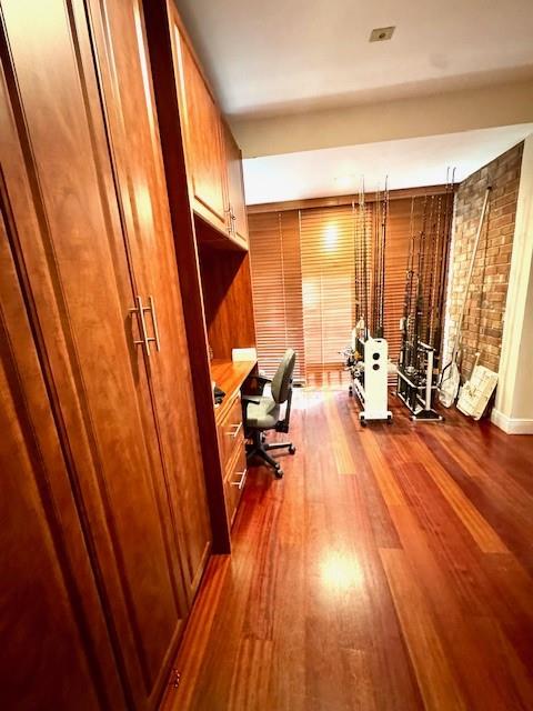 1540 Northeast Quayside Terrace, Unit D1 Miami, FL 33138 - Photo 20 of 45 a view of living room with furniture and wooden floor