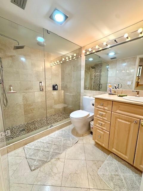 1540 Northeast Quayside Terrace, Unit D1 Miami, FL 33138 - Photo 21 of 45 a bathroom with a granite countertop sink mirror toilet and shower