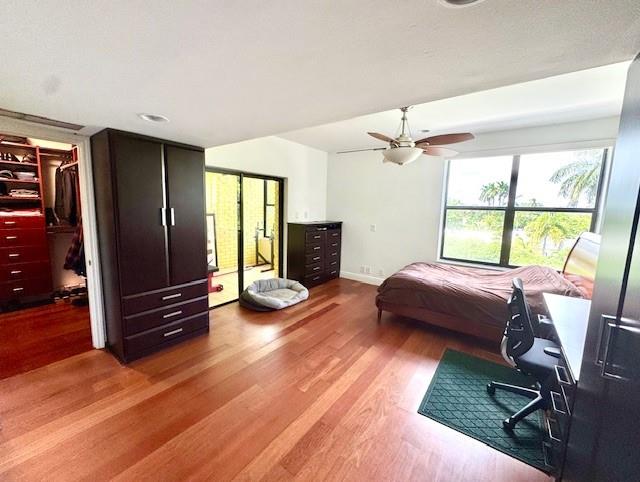 1540 Northeast Quayside Terrace, Unit D1 Miami, FL 33138 - Photo 24 of 45 a bedroom with furniture and a window