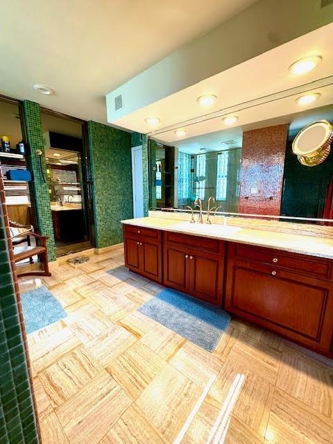 1540 Northeast Quayside Terrace, Unit D1 Miami, FL 33138 - Photo 28 of 45 a room with a large bed and flat tv screen next to a window