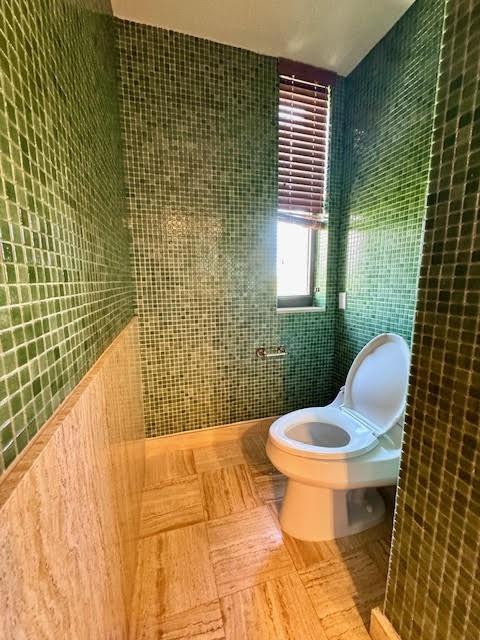 1540 Northeast Quayside Terrace, Unit D1 Miami, FL 33138 - Photo 29 of 45 a bathroom with a toilet and sink