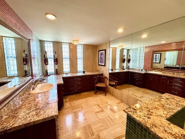 1540 Northeast Quayside Terrace, Unit D1 Miami, FL 33138 - Photo 34 of 45 a large spacious bathroom with a large tub and sink