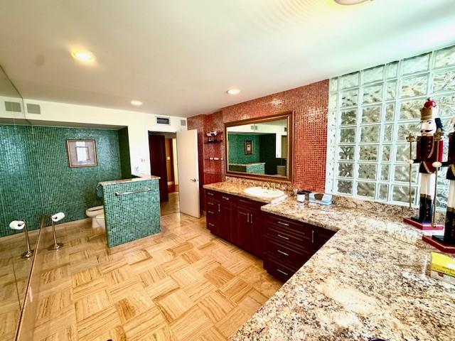 1540 Northeast Quayside Terrace, Unit D1 Miami, FL 33138 - Photo 35 of 45 a living room with furniture a flat screen tv and a large window