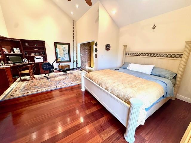 1540 Northeast Quayside Terrace, Unit D1 Miami, FL 33138 - Photo 38 of 45 a large bedroom with a bed and wooden floor