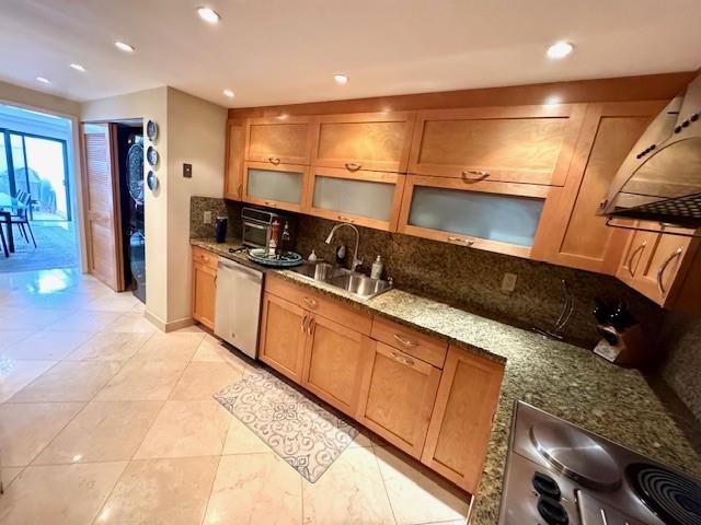 1540 Northeast Quayside Terrace, Unit D1 Miami, FL 33138 - Photo 7 of 45 a large kitchen with stainless steel appliances kitchen island granite countertop a sink and cabinets