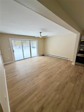 a kitchen with a refrigerator and a sink