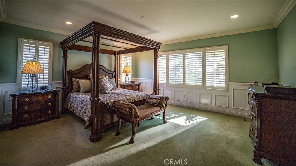 27 Mountain Laurel Way Azusa, CA 91702 - Photo 24 of 39 a bedroom with a bed and a dresser next to a window