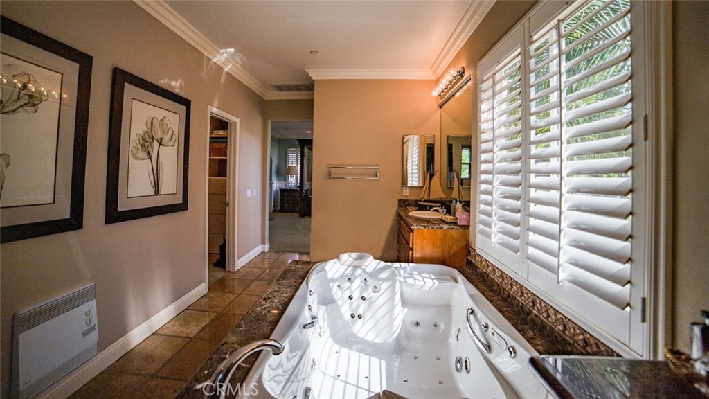 27 Mountain Laurel Way Azusa, CA 91702 - Photo 28 of 39 a bedroom with a bed and wooden floor