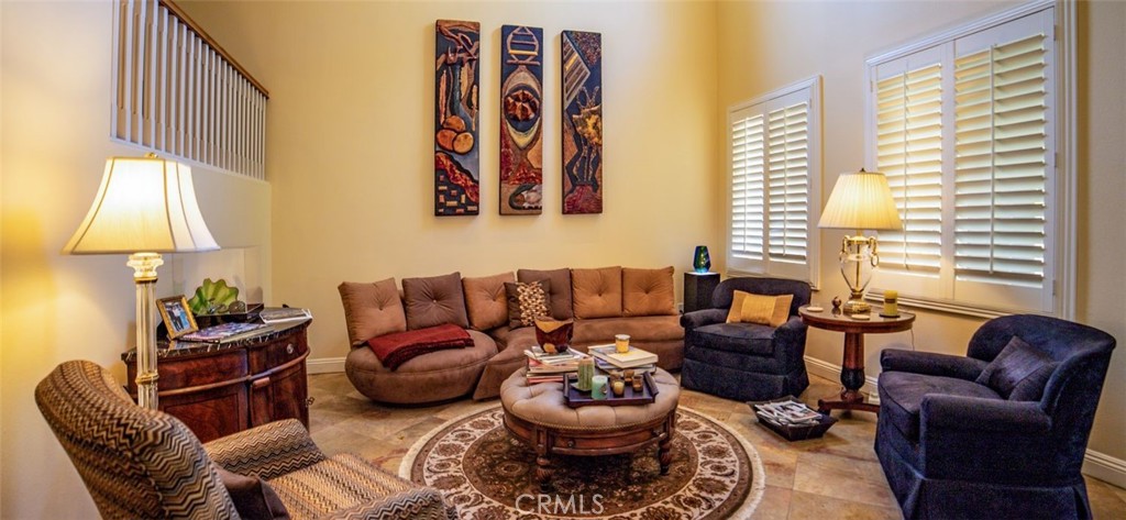 27 Mountain Laurel Way Azusa, CA 91702 - Photo 3 of 39 a living room with furniture and a lamp