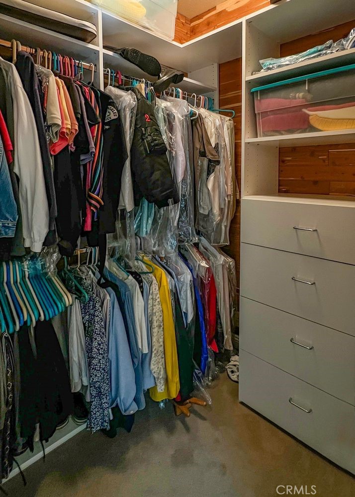 27 Mountain Laurel Way Azusa, CA 91702 - Photo 31 of 39 a view of walk in closet with clothes and shoes