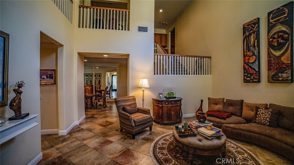 27 Mountain Laurel Way Azusa, CA 91702 - Photo 5 of 39 a living room with furniture and wooden floor
