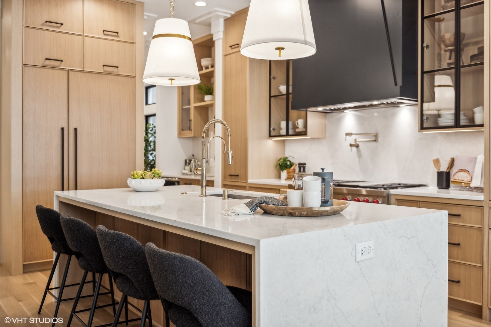 1413 North Mohawk Street Chicago, IL 60610 - Photo 11 of 51 a kitchen with a table chairs and white cabinets