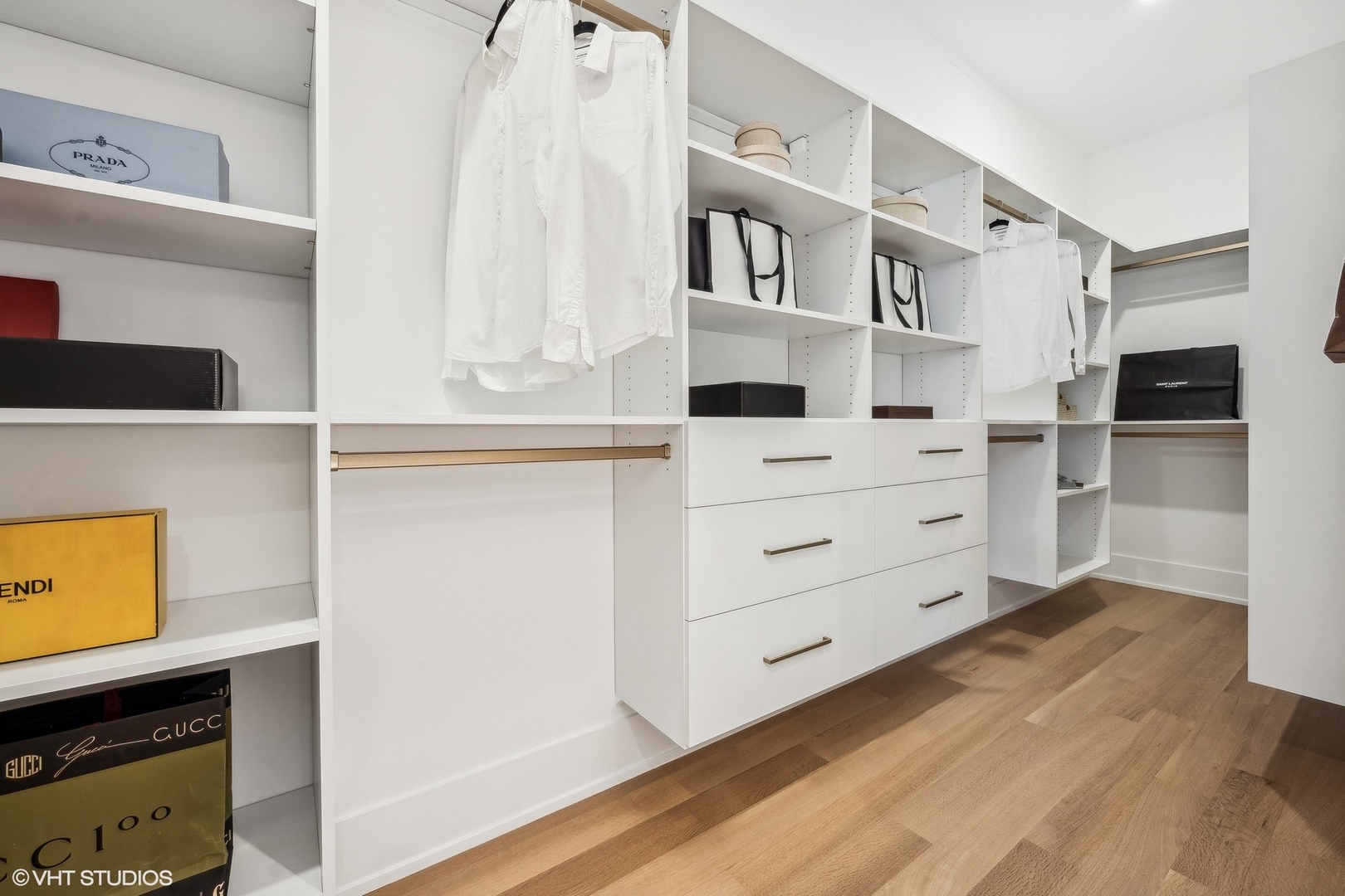 1413 North Mohawk Street Chicago, IL 60610 - Photo 23 of 51 a view of walk in closet with empty racks