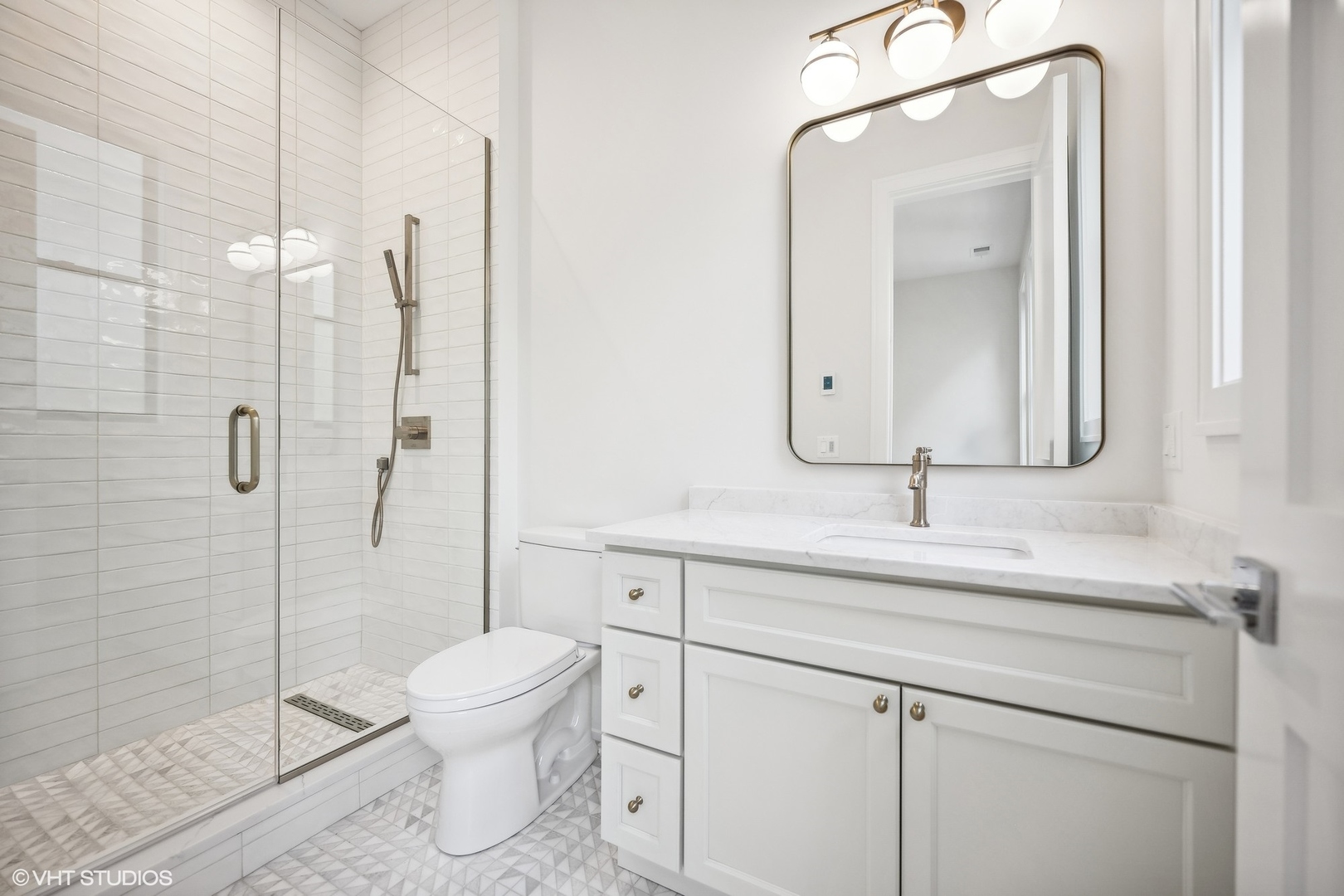 1413 North Mohawk Street Chicago, IL 60610 - Photo 32 of 51 a bathroom with a toilet sink a shower and