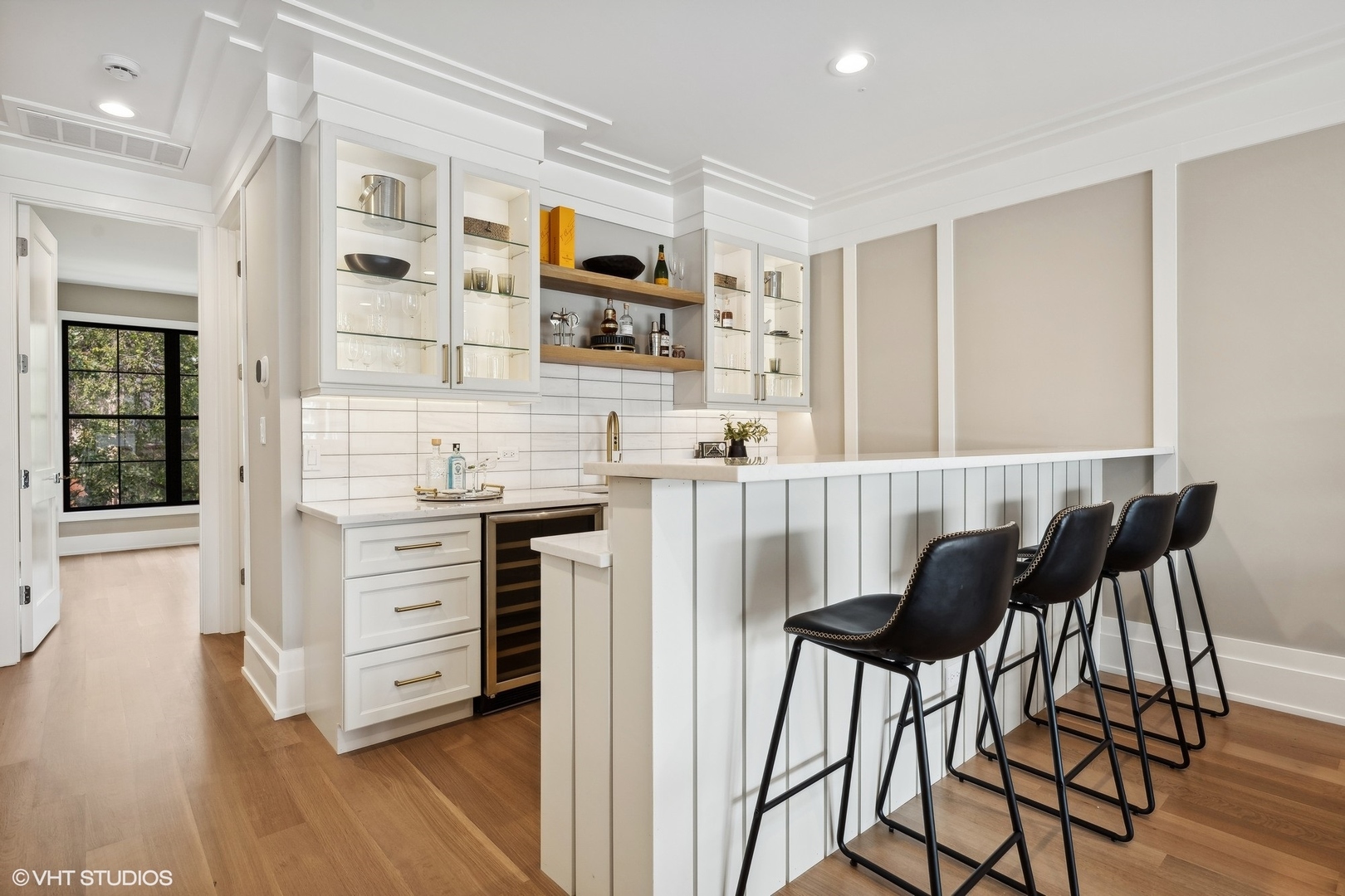 1413 North Mohawk Street Chicago, IL 60610 - Photo 39 of 51 a kitchen with stainless steel appliances kitchen island granite countertop a stove and white cabinets
