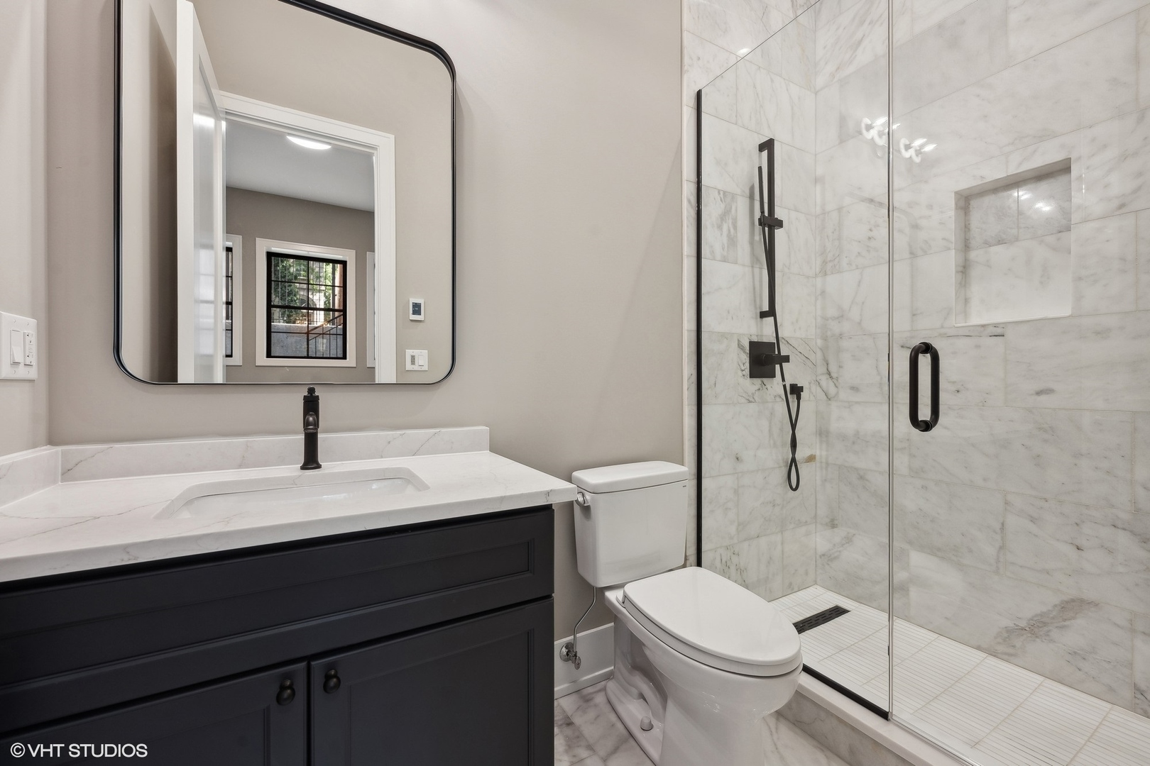 1413 North Mohawk Street Chicago, IL 60610 - Photo 48 of 51 a bathroom with a sink toilet and shower